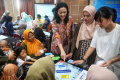 AXA Mandiri Bantu Nutrisi dan Alat Kesehatan untuk Ibu Hamil