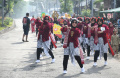 Adu Keren Warga Ramaikan Karnaval Hari Pahlawan