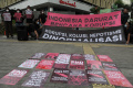 Aksi memperingati Hari Anti Korupsi Sedunia