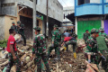Bersih-bersih Sebulan Pascabencana Banjir Bandang di Aceh Tamiang
