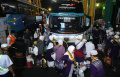 Jamaah-Haji-Kloter-9-Tiba-di-Asrama-Haji-Sukolilo-Surabaya_20250615_171141.jpg