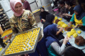Kue-Kering-Lebaran-di-Kampung-Nastar-Laris-Manis_20250318_100315.jpg