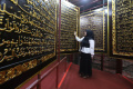 Melihat-Ukiran-Al-Quran-Raksasa-di-Palembang_20250324_182930.jpg