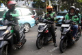 Pemerintah-Turunkan-Komisi-Tarif-Ojek-Daring_20260508_194334.jpg