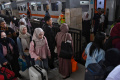 Pemudik-Mulai-Padati-Stasiun-Kereta-Api-Kota-Baru-Malang_20250328_134932.jpg