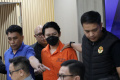 Pengamanan-dan-Pemulangan-WNA-Filipina-Buronan-Interpol_20241126_155057.jpg