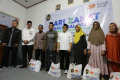 Penyaluran-Serentak-Zakat-Fitrah-di-29-Kota_20250330_000125.jpg