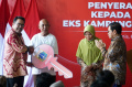 Penyerahan Kunci Hunian kepada Warga Eks Kampung Bayam