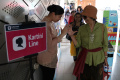 Perempuan-Gratis-Naik-TransJakarta-MRT-LRT-Peringati-Hari-KartiniPerempuan-Gratis-Naik-TransJakarta-MRT-LRT-Peringati-Hari-Kartini_20250421_121319.jpg