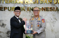 Polri-dan-Kemenhaj-Bentuk-Satgas-Haji-2026_20260409_151222.jpg
