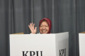 Risma-Gunakan-Hak-Pilih-di-Surabaya_20241127_095552.jpg