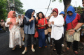 Risma-Gunakan-Hak-Pilih-di-Surabaya_20241127_100625.jpg