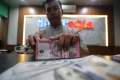 Rupiah Ditutup Menguat Rp16.768 per USD Sore Ini