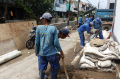 Satpel-SDA-Kemayoran-Membersihkan-Puing-Puing_20250212_113142.jpg