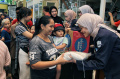 Warga-Antre-Beras-Murah_20250516_211046.jpg