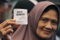 Warga-Antre-Beras-Murah_20250516_211050.jpg