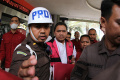 achsanul-qosasi-kenakan-rompi-merah-muda_20231103_193854.jpg