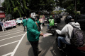 aksi-melawan-kejahatan-demokrasi-dan-konstitusi_20240111_153206.jpg