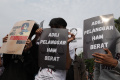 aksi-peringatan-hari-hak-asasi-manusia-di-indonesia_20231207_202829.jpg