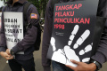 aksi-peringatan-hari-hak-asasi-manusia-di-indonesia_20231207_202831.jpg