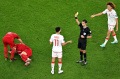 Aksi Wasit Cesar Ramos saat Denmark Kontra Tunisia