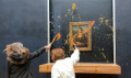 aktivis-lingkungan-lempar-sup-ke-lukisan-mona-lisa_20240130_150658.jpg