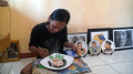 Bagus Dian Margian Seniman Pelukis Wajah di Piring