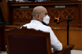 Baiquni Wibowo Jalani Sidang Dakwaan