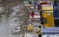 balap-burung-dara-di-gemari-warga-bantaran-kali-ciliwung_20220525_175559.jpg