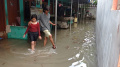 banjir-di-perumahan-jalan-sultan-ageng-tirtayasa-tangerang_20220317_173244.jpg