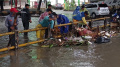 banjir-luapan-kali-sabi-akibatkan-sampah-menumpuk_20220716_173029.jpg