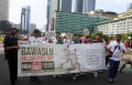 bawaslu-on-car-free-day-kampanyekan-pemilu-2024_20240122_192536.jpg
