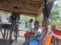 belajar-membaca-menulis-dan-berhitung-bersama-satgas-yonif-raide_20220826_100250.jpg