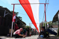 Bendera Merah Putih Sepanjang 308 M Dipasang Warga Malang