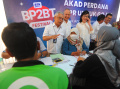 BTN Menjawab Mimpi Abang Gojek Punya Rumah