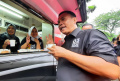 caferavan-ganjar-mahfud-bagikan-kopi-gratis_20231231_153549.jpg