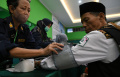 Calon Haji Kloter Pertama Tiba di Asrama Haji Surabaya