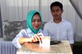 calon-walikota-airin-mencoblos-pilkada-tangsel_20151209_181726.jpg