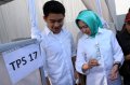 calon-walikota-airin-mencoblos-pilkada-tangsel_20151209_181953.jpg