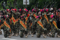 Defile Prajurit TNI Dan Kendaraan Tempur pada HUT ke-77 TNI