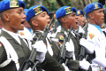 Defile Prajurit TNI Dan Kendaraan Tempur pada HUT ke-77 TNI