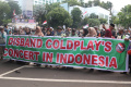 Demo Tolak Konser Coldplay