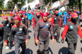 desak-pj-gubernur-jabar-terbitkan-sk-upah-pekerja_20240320_195115.jpg
