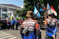 desak-pj-gubernur-jabar-terbitkan-sk-upah-pekerja_20240320_195122.jpg