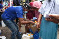 disperindag-malang-gelar-operasi-pasar-murah-minyak-gorang-curah_20230202_135524.jpg