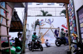 Dosen dan Mahasiswa DKV Unpas Buat Mural di Kampung Wisata