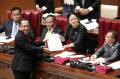dpr-sahkan-uu-tentang-desa-dan-ruu-dkj_20240328_170145.jpg