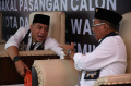 eri-cahyadi-armuji-daftar-kpu-kota-surabaya_20240828_141812.jpg
