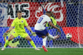 euro-2024-prancis-susah-payah-kalahkan-austria_20240618_072252.jpg