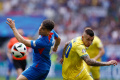 euro-2024-ukraina-comeback-kalahkan-slovakia-2-1_20240621_223509.jpg